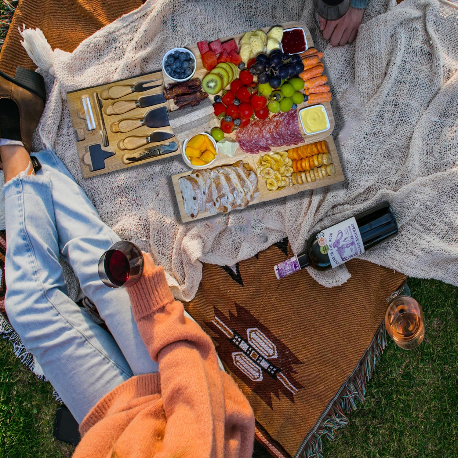 Wulumi charcuterie board handle shows easy transport for outdoor picnics