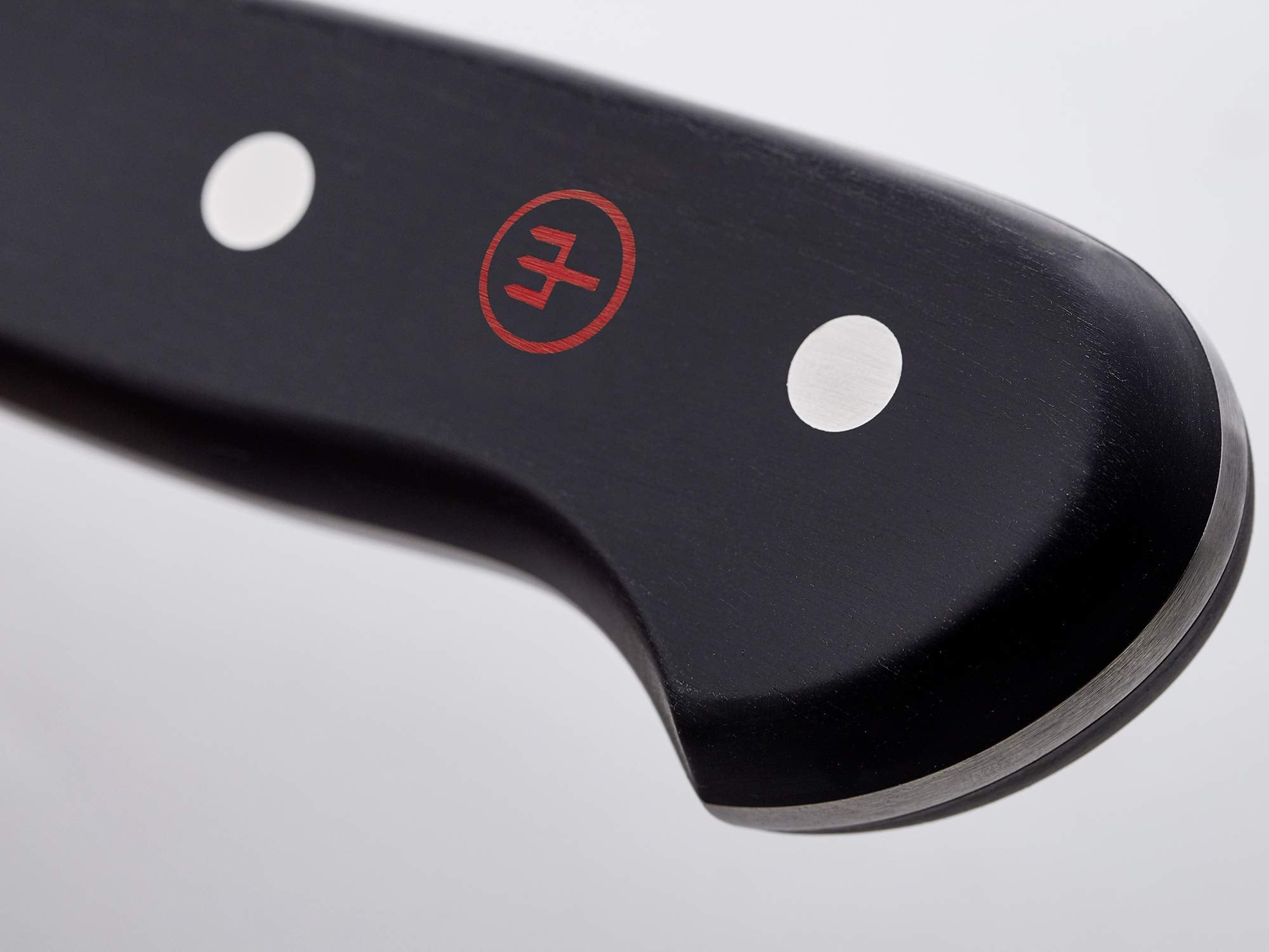 Precision-forged steel edge demonstrates longevity and sharpness in daily prep