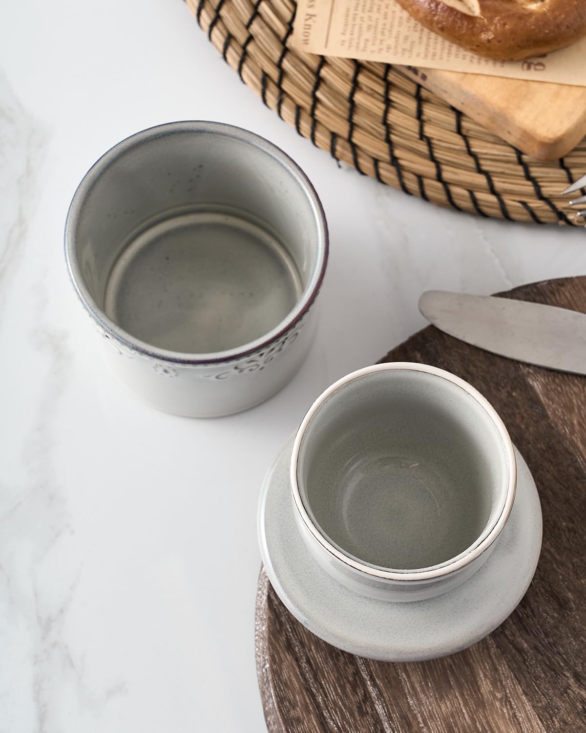 Lid and water line of Xela butter keeper shown for freshness