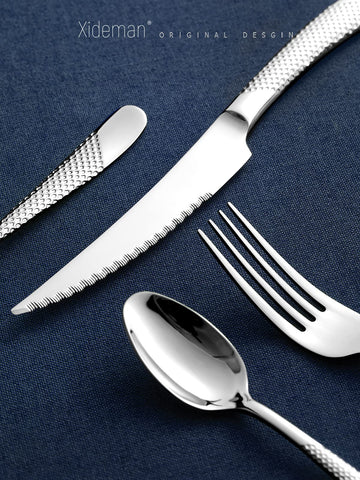 Xideman ergonomic handle flatware offers comfortable grip during long dinners.