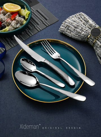 Xideman hammered fork close-up demonstrates balanced weight for comfortable dining.