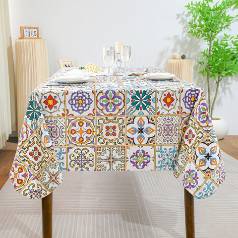 Xirggur waterproof vinyl tablecloth protects surfaces from spills during meals.