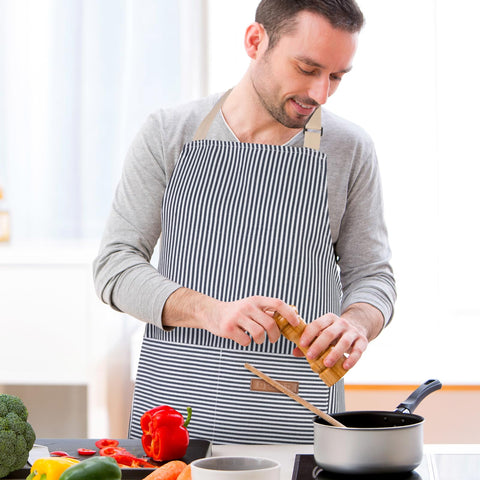 XLSXEXCL kitchen apron in use shows versatility for cooking and crafts