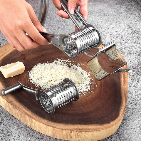 Xmipbs rotary grater with four stainless drum blades enabling versatile shredding textures.