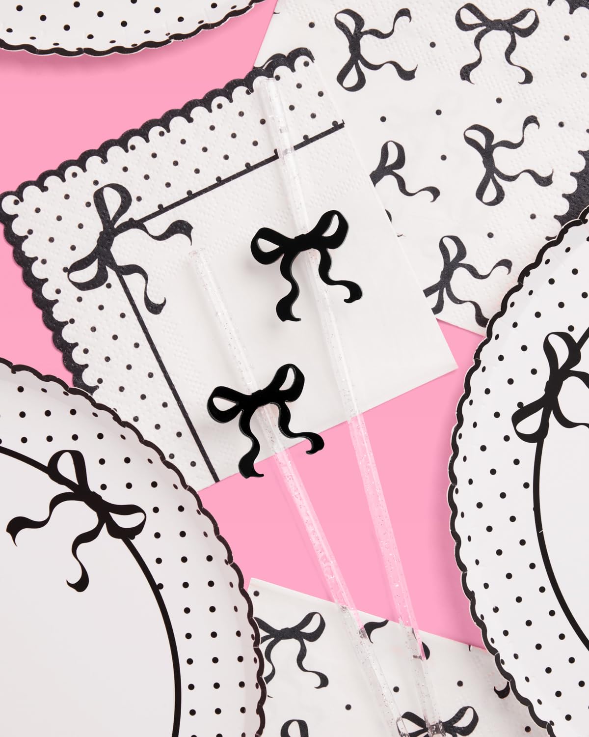 xo Fetti removable black bow acrylic topper elevates each drink.