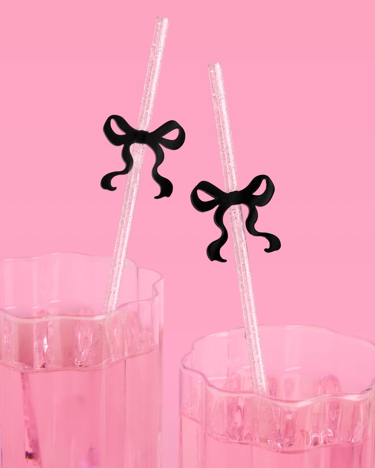 xo Fetti party table with glitter straws enhances photo-worthy celebrations.