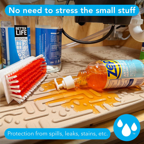 Xtreme Mats undersink mat shows angled side walls to contain spills.