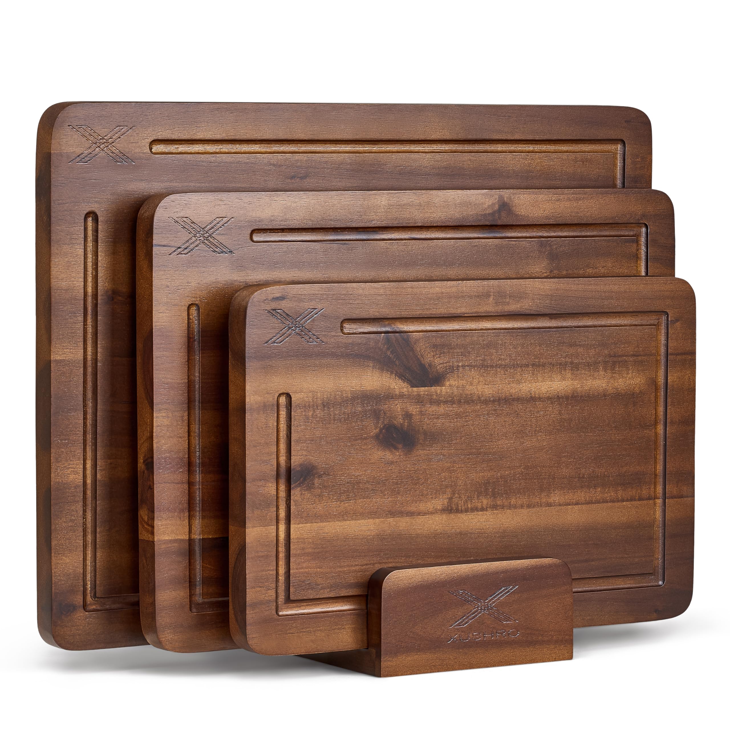 Xushro three-pack acacia boards stacked for easy storage and prep.