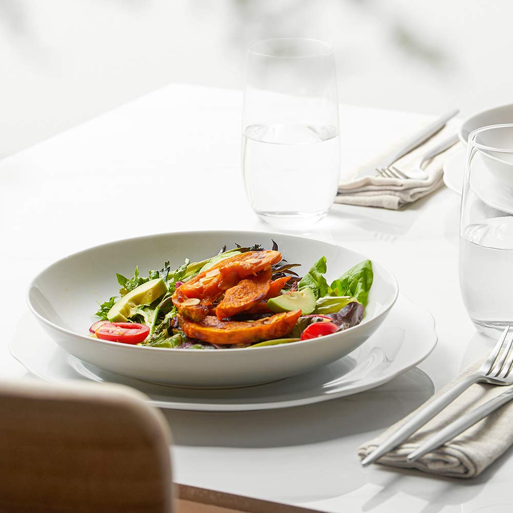 Y YHY bowls pair with other white dinnerware for cohesive tables.