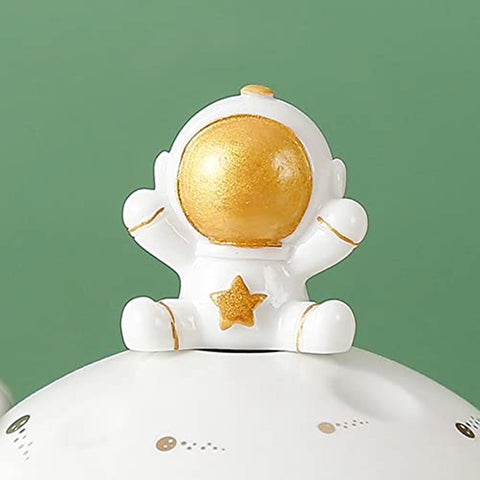 Close-up of Yalucky astronaut embossing showing texture and playfulness.