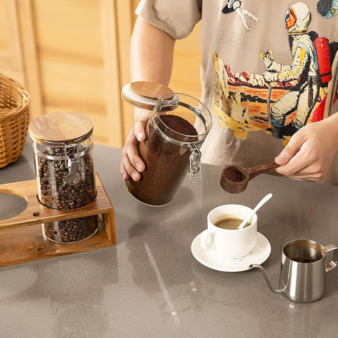 Yangbaga coffee-bar organizer includes wood spoon for scooping.