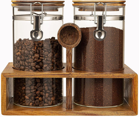 Yangbaga glass coffee canisters with wood shelf provide clear airtight storage.