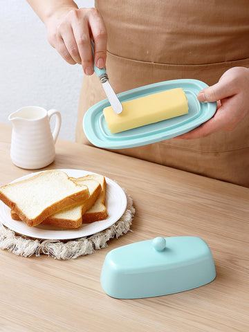 Turquoise cover knob handle makes opening the butter dish easy
