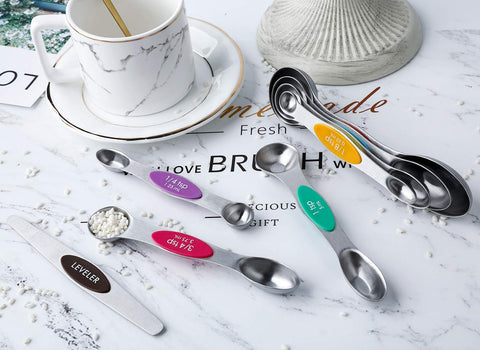YellRin kitchen-storage-magnet keeps spoons on fridge or wall strip for easy access.
