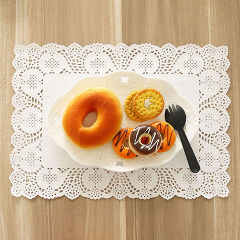 YESON rectangle white placemats protect surfaces and enhance decor.