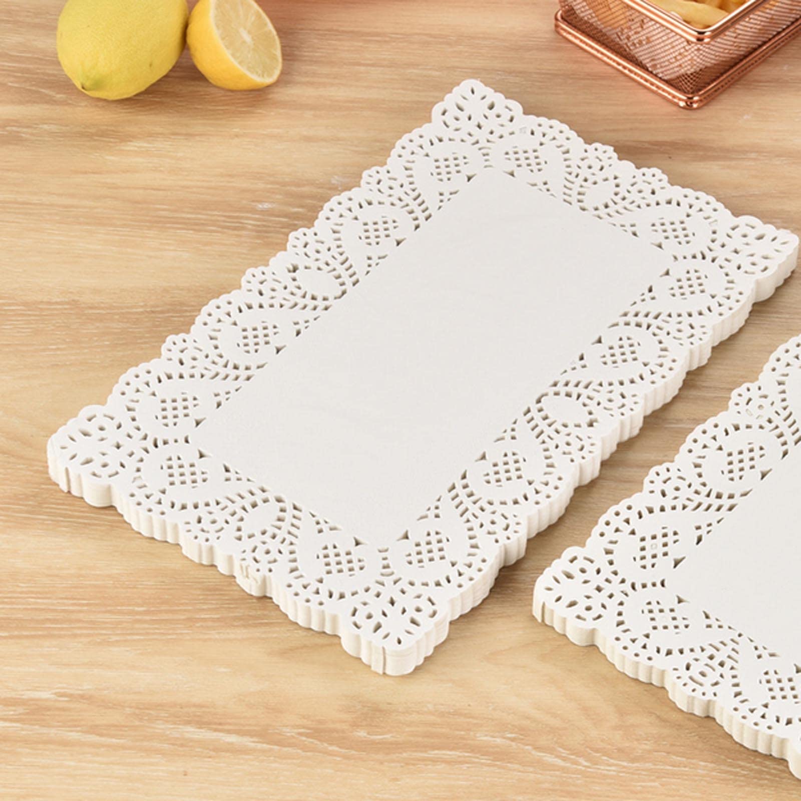 YESON rectangle white lace doilies on plates add elegant presentation.