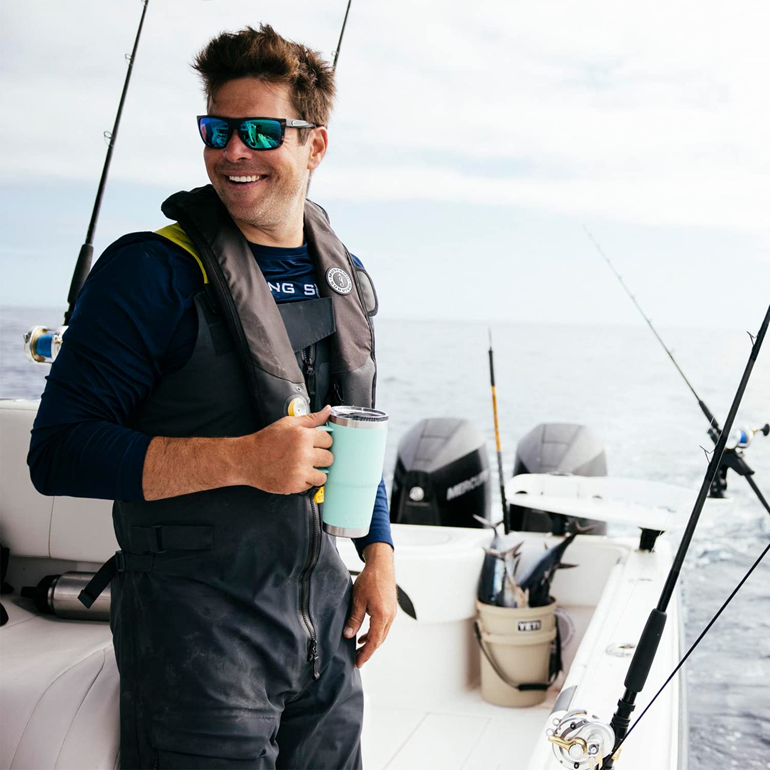 YETI Rambler 20 oz travel mug seafoam stainless-steel body implies dent-resistant durability.