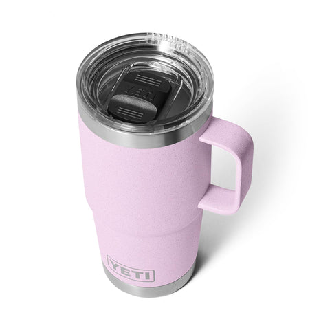 YETI Rambler 20 oz Travel Mug in stainless steel, Cherry Blossom finish, maintains drink temperature on commutes.