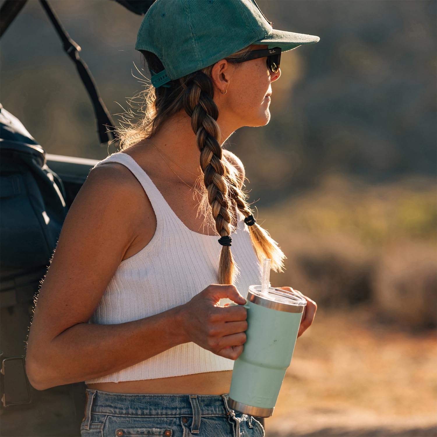 YETI Rambler 25 oz with cup-holder-friendly design eases transport during commutes.