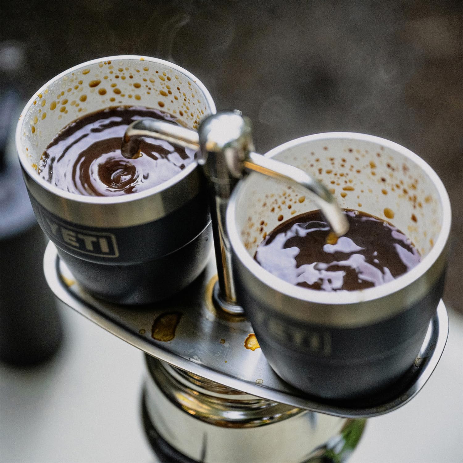 YETI Rambler stackable cup shown in a camp kitchen.