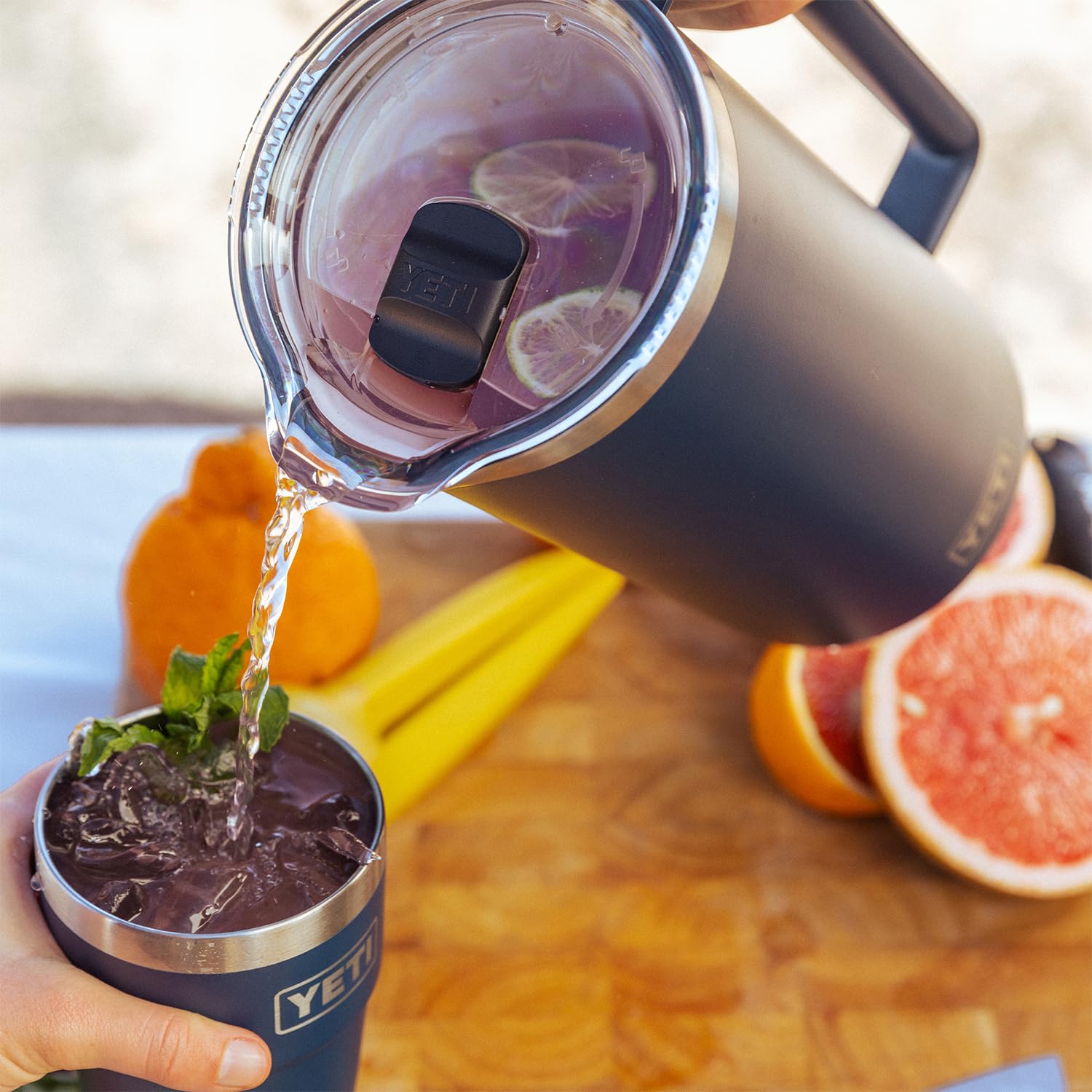 Pitcher filled with ice demonstrates the large 64-ounce capacity for gatherings.