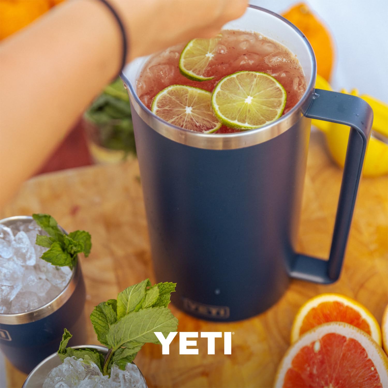 Easy-to-grip handle and wide pouring spout for convenient serving.