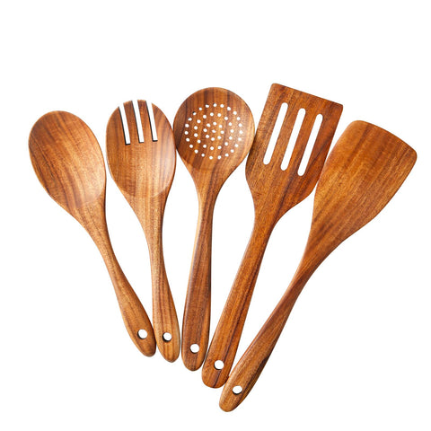 Yhendelion teak spoon strainer in use for draining pasta safely