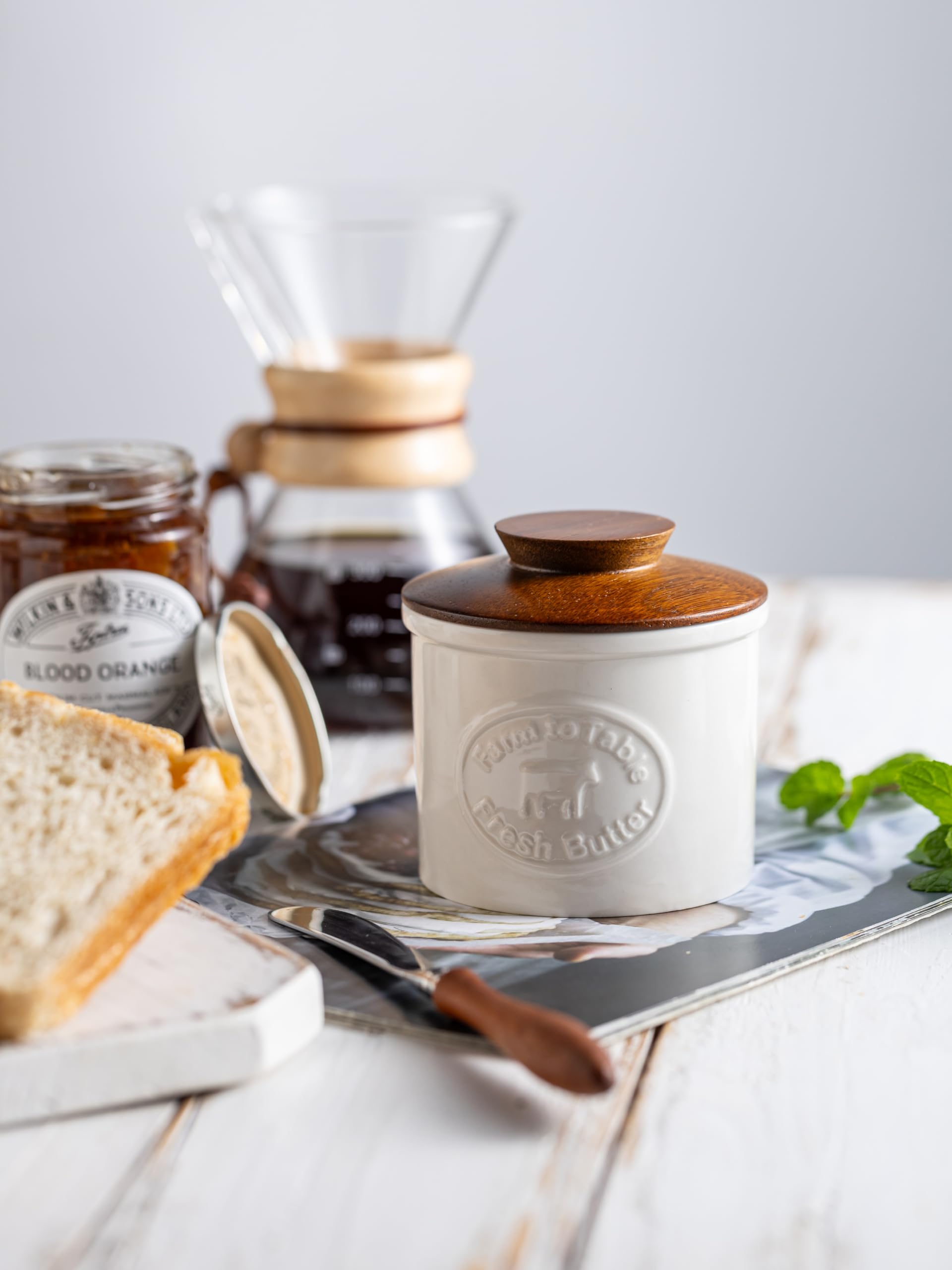 YHOJOY butter crock shown on countertop for farmhouse kitchen style.
