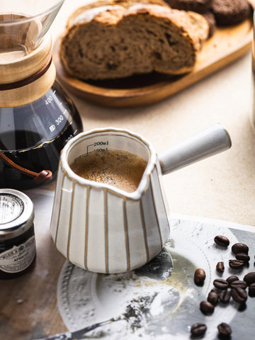 YHOJOY espresso cups with comfortable grip handle for stable pouring.