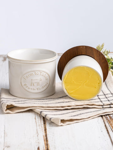 YHOJOY cream white butter keeper on counter, ready for spreadable butter.