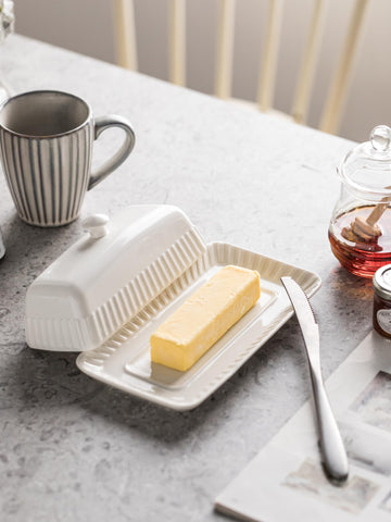 YHOJOY minimalist striped butter dish complements any kitchen style.