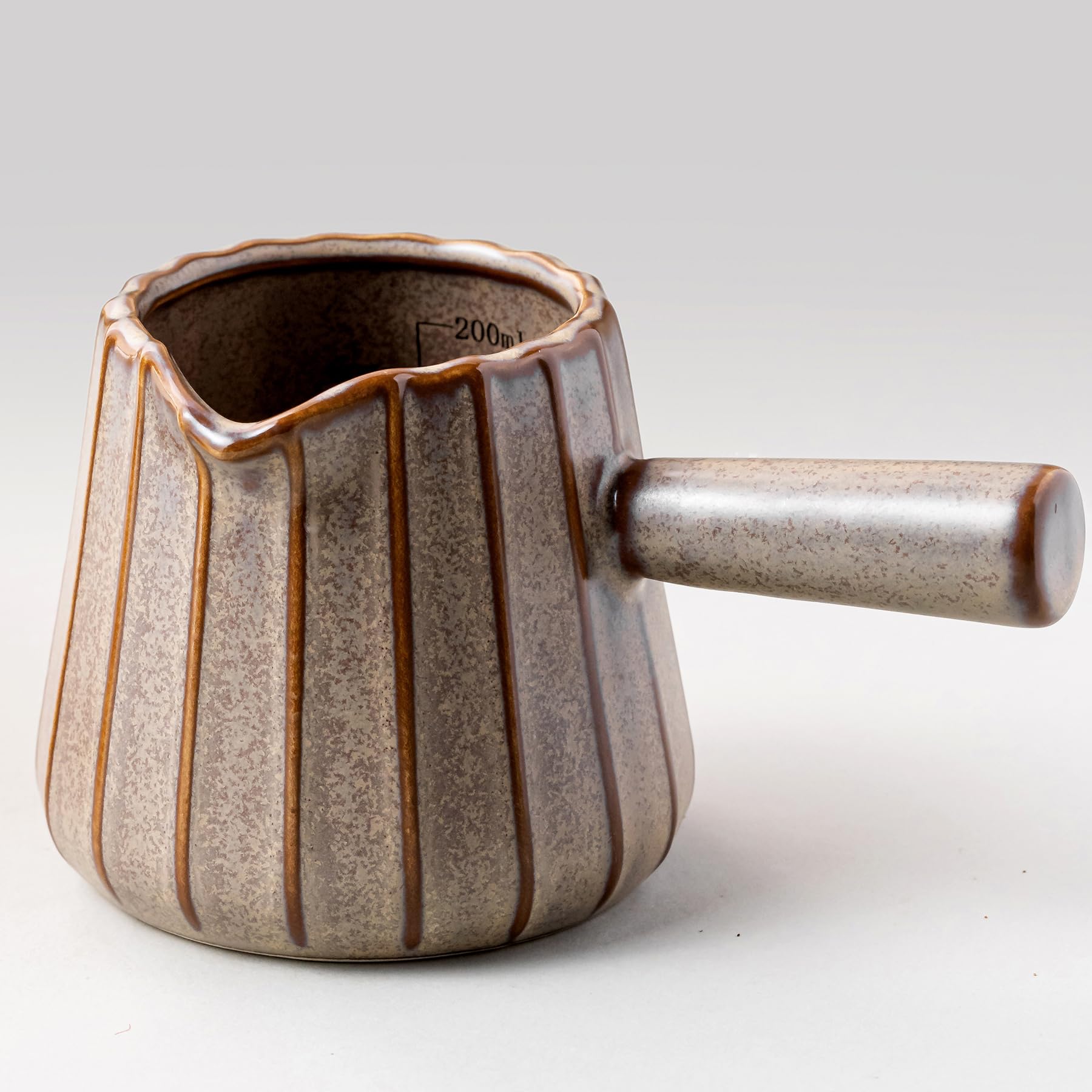 YHOJOY espresso cup with handle for stable, controlled pours.