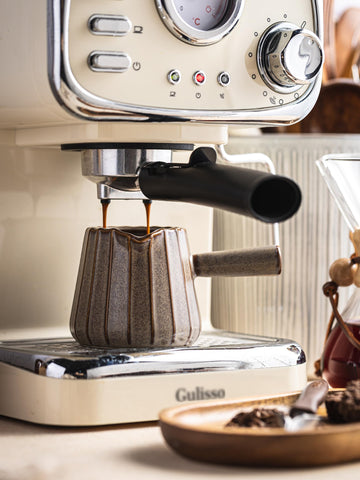 YHOJOY multi-use cup for measuring and pouring in the kitchen.