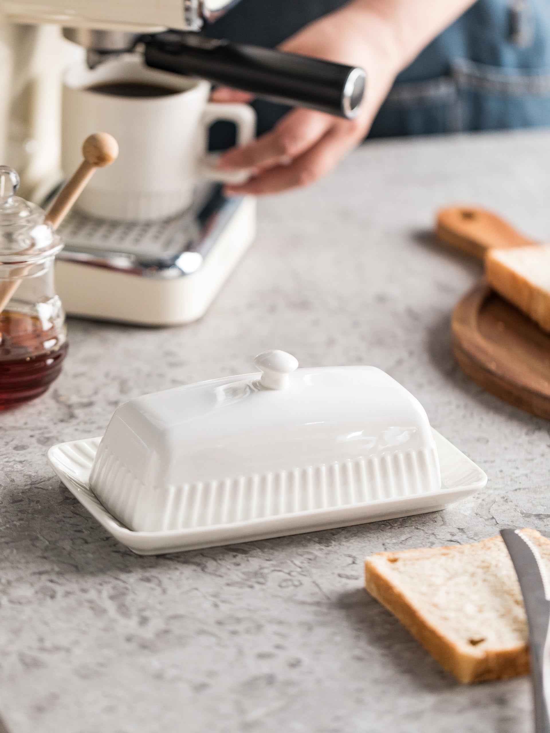 YHOJOY porcelain butter dish demonstrates durable construction for daily use.