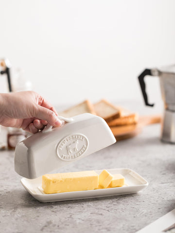 YHOJOY raised-edge butter dish provides mess-free storage on the counter