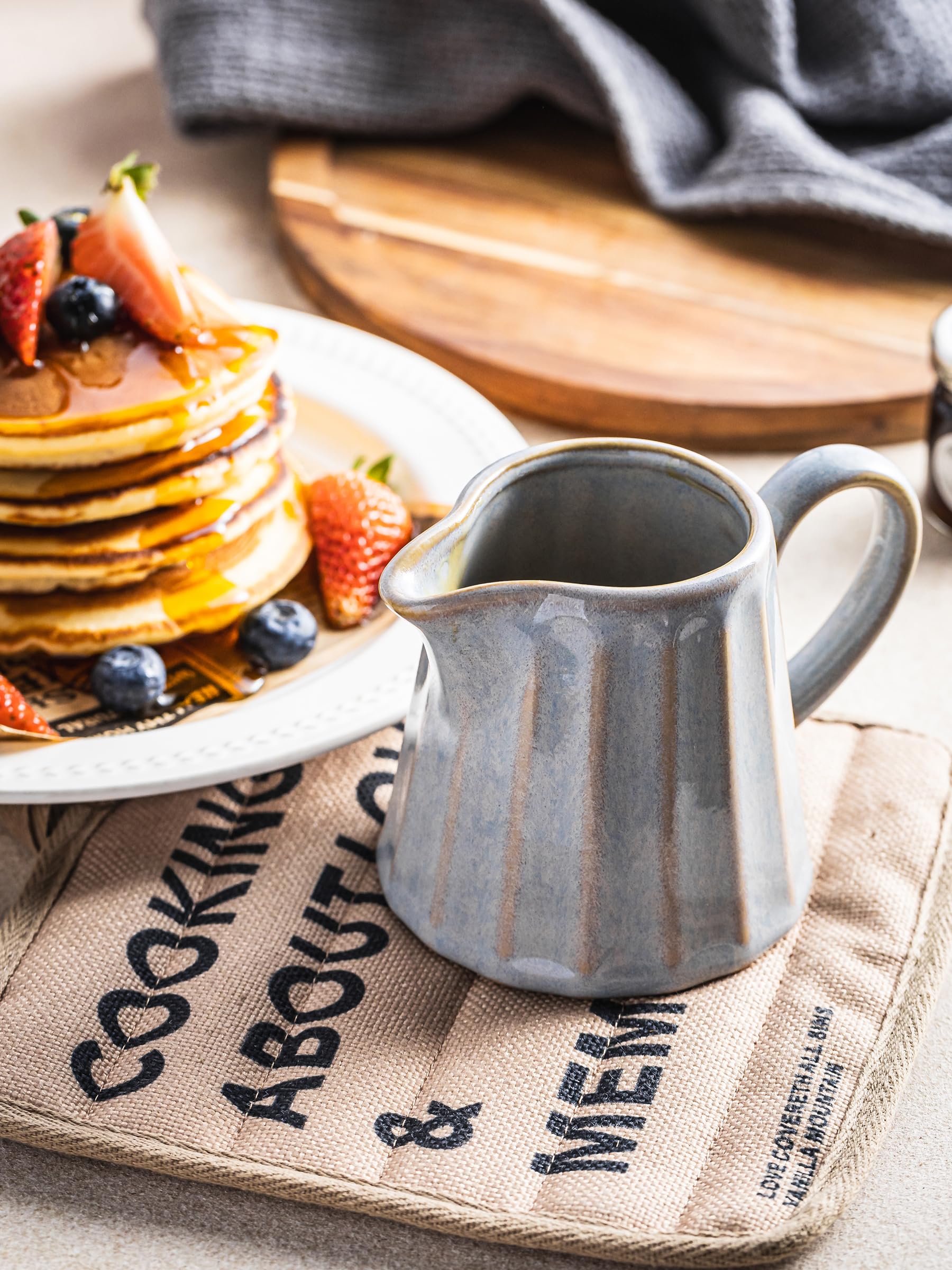 YHOJOY striped-glaze creamer complements kitchen decor and casual entertaining.