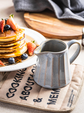 YHOJOY striped-glaze creamer complements kitchen decor and casual entertaining.