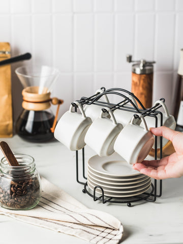 YHOSSEUN metal stand display elevates a compact espresso set.