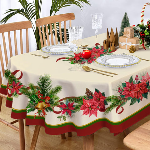 Yighty oval tablecloth features holly leaves for warm holiday ambience.