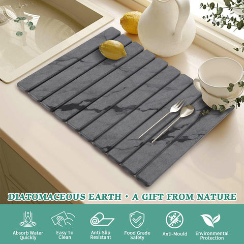 YLjindoia bottles and cups drying on mat keep countertops organized.