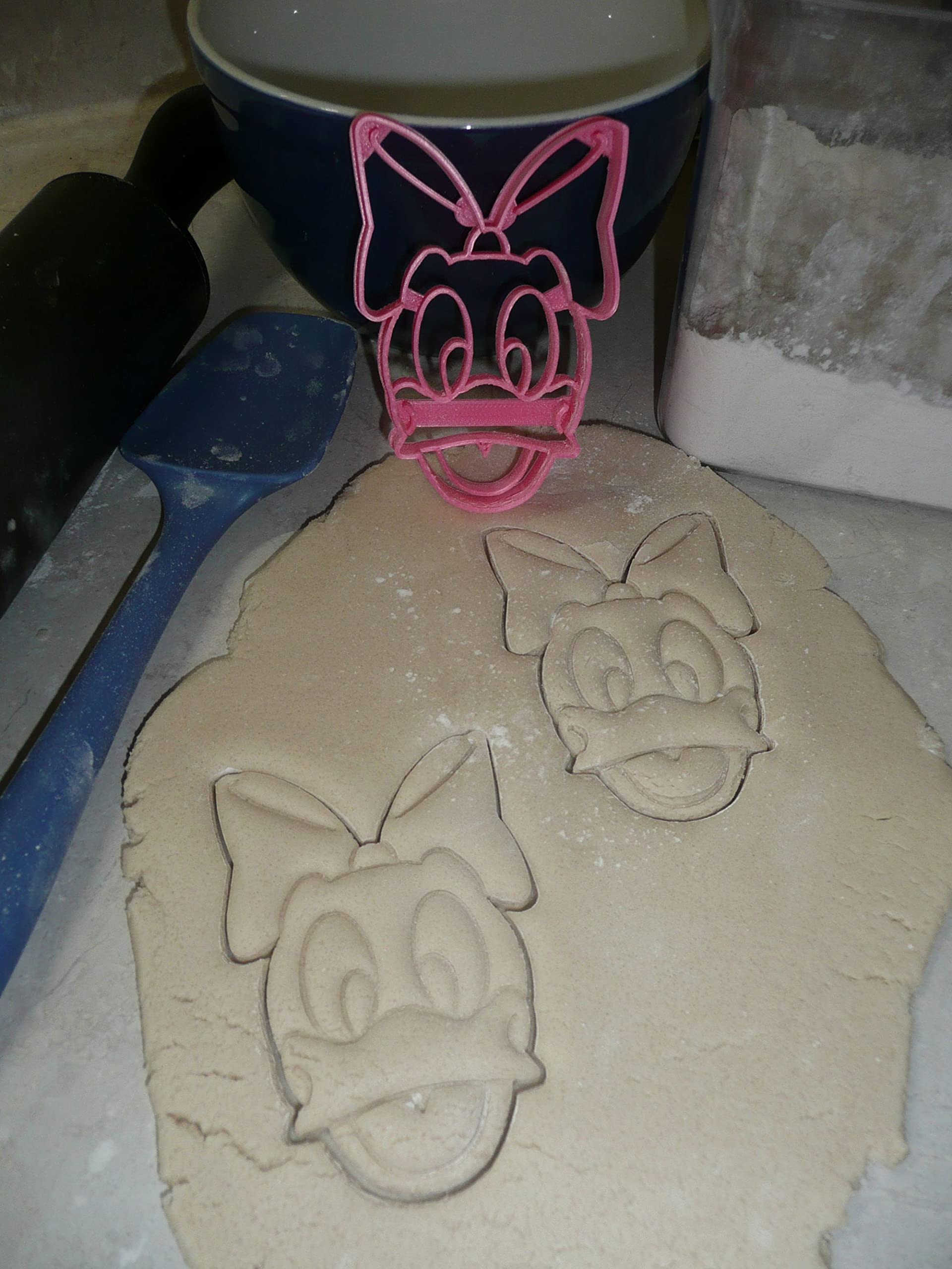 Shaping dough into whimsical mouse faces with YNGLLC cutters