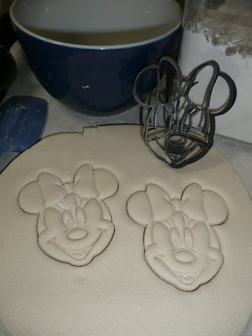 Kids using dough with YNGLLC cutters for creative play