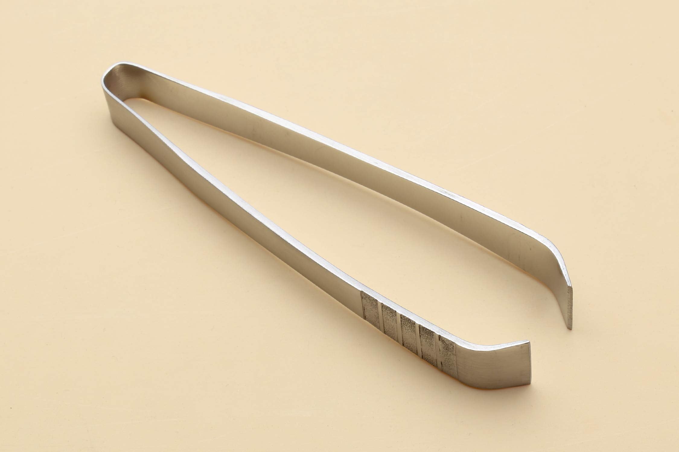 Yoshihiro Japanese sushi garnishing tool with ergonomic grip for steady handling.