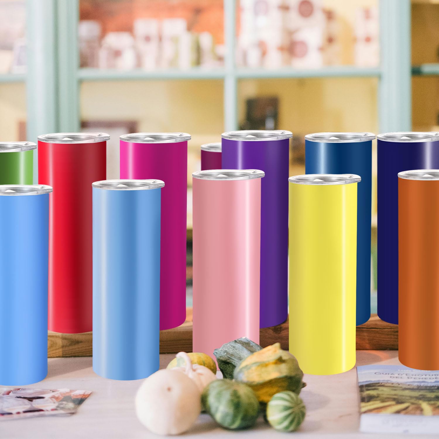 YOUKE OLA lifestyle shot with colorful tumblers