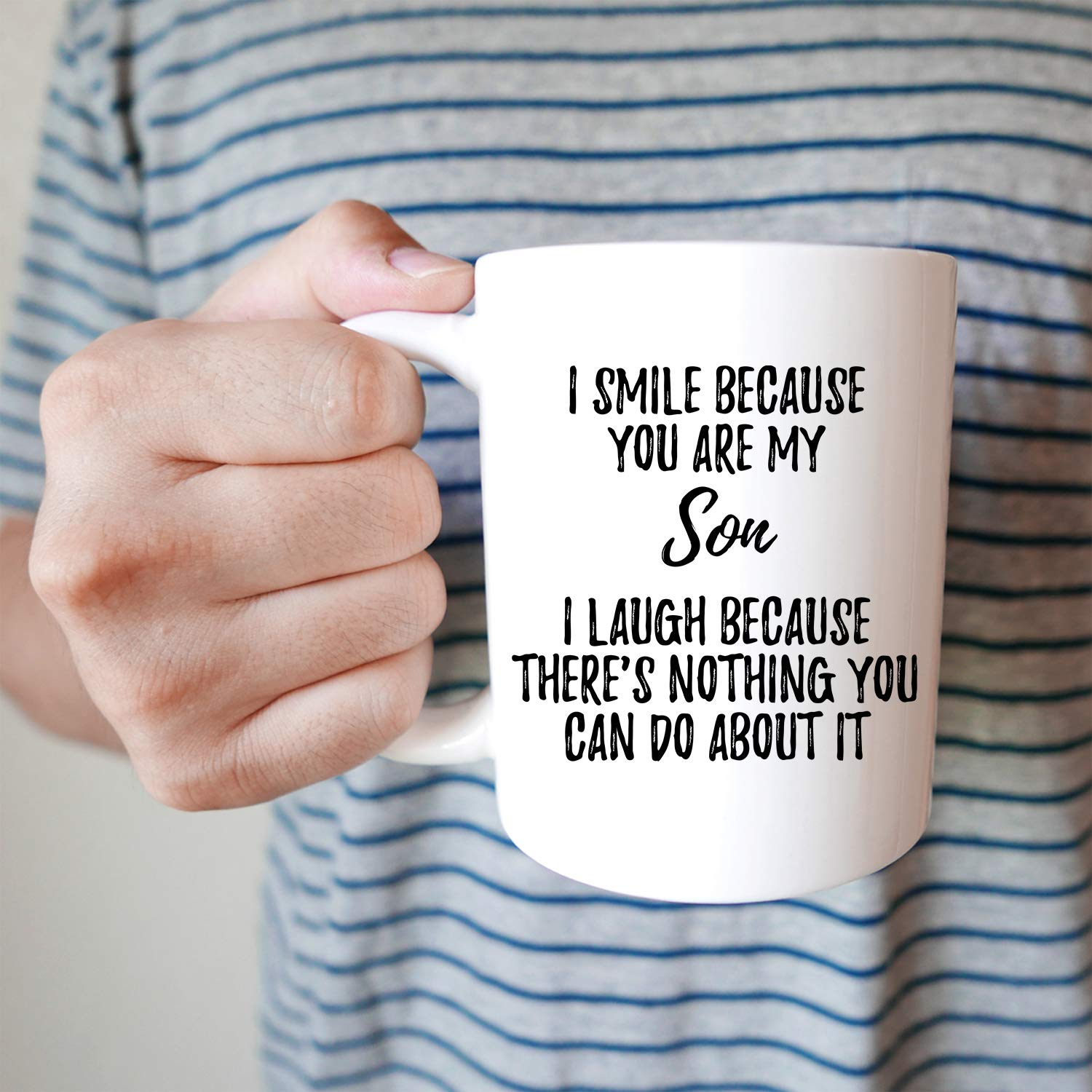 YouNique Designs mug in hand highlighting comfortable grip