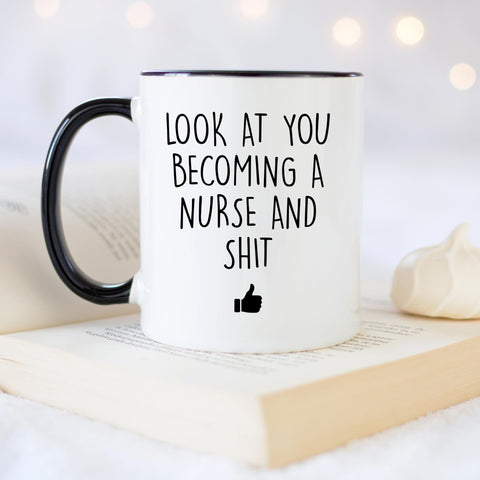 YouNique Designs nursing school mug handle closeup highlighting ergonomic black handle.