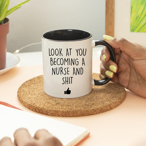YouNique Designs nursing school mug 11oz microwave-safe for quick refills.