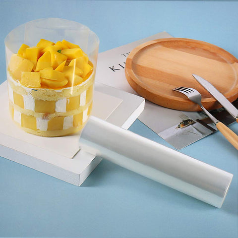 YQL clear sheet keeps cake edges intact during decoration.