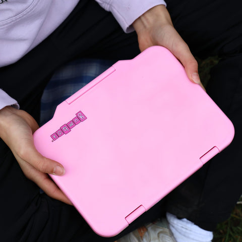 Yumbox Prêt lightweight lunchbox fits easily in most bags.
