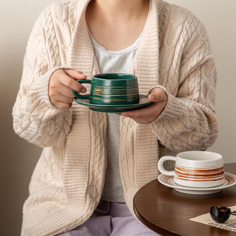 YUN TAO ergonomic-handle cup for comfortable grip.